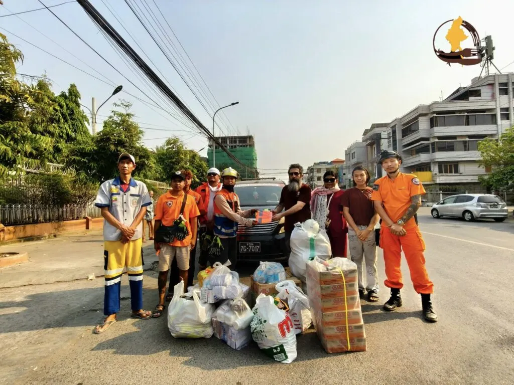 Earthquake relief volunteers delivering supplies