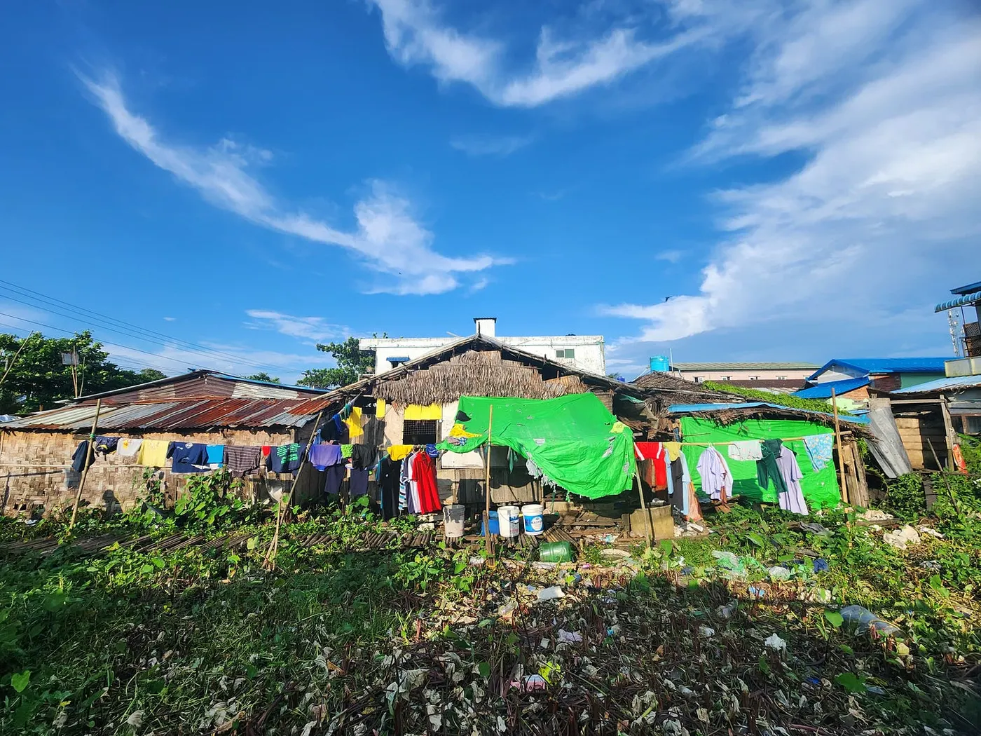 Houses in Hlaing Thar Yar, Yangon, under a wide sky